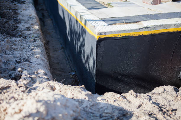 Professional Wet Basement Repair technician working in Chesterhill, OH
